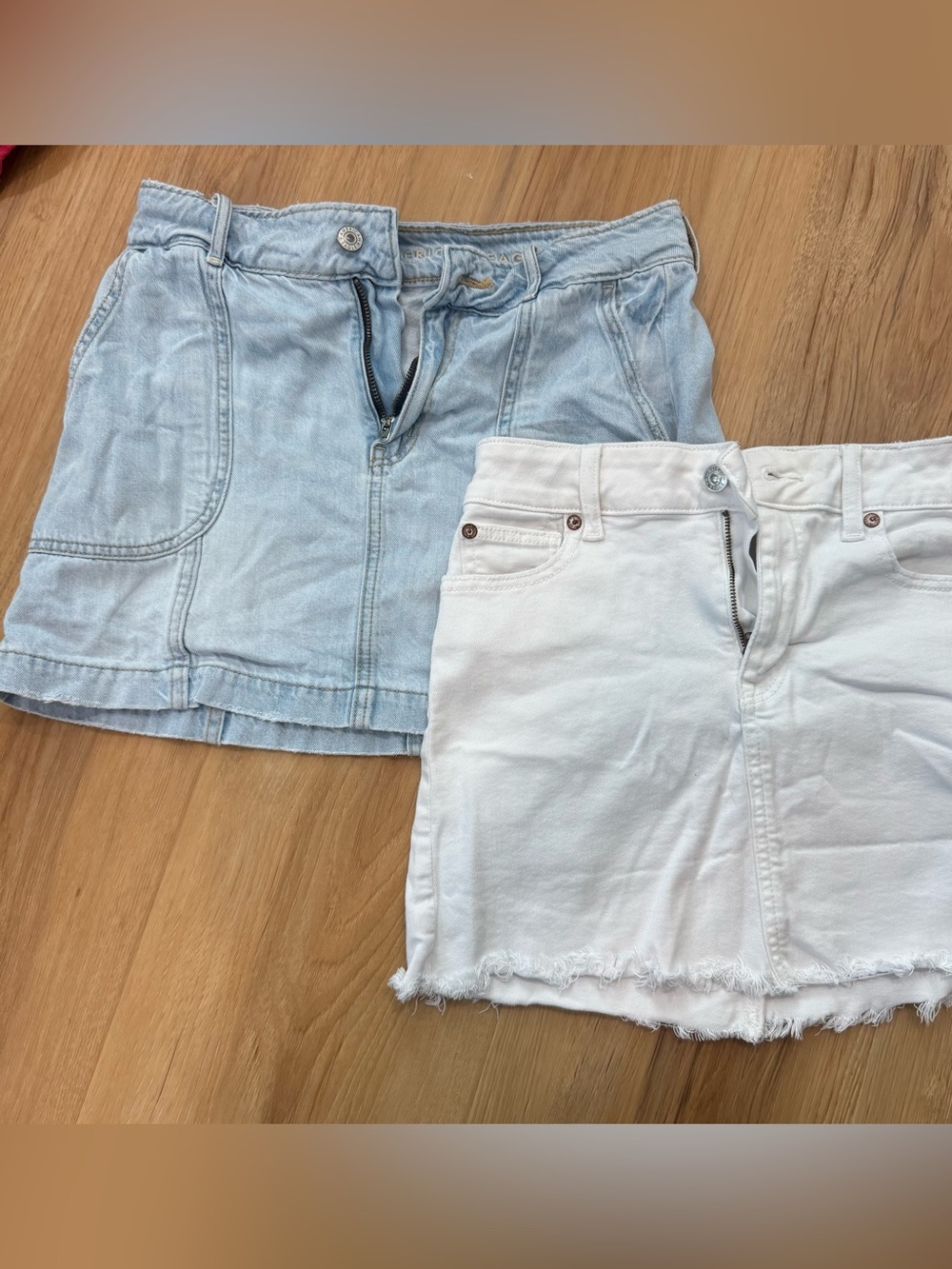 American Eagle size 0 Light Wash Denim Skirt + White Denim Mini Skirt (2-Pack)